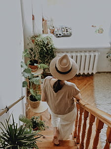Woman Walking on Wooden Stair thumbnail