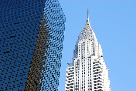 low angle photography of white concrete building thumbnail