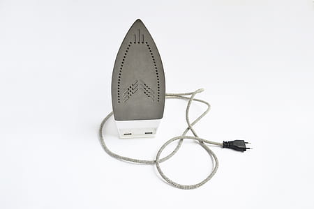 white and gray clothes flat iron on floor thumbnail