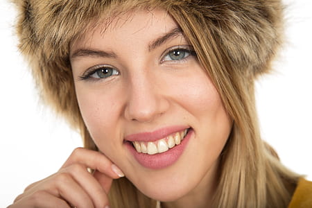 woman wearing brown fur cap thumbnail