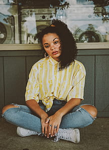 woman sitting on floor thumbnail