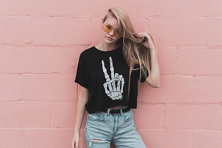 woman standing on wall thumbnail
