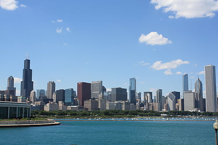 body of water beside buildings thumbnail