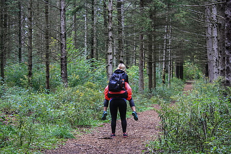 person carrying child thumbnail