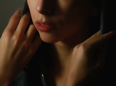 woman holding black hoodie thumbnail