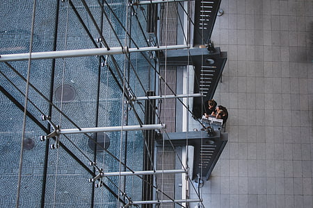 two person sitting on chair thumbnail