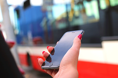 person holding space gray iPhone 6 thumbnail