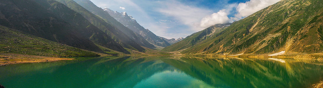 Green Lake Surrounded by Mountain thumbnail
