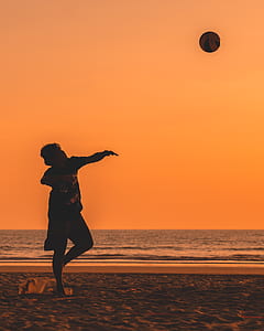 man playing beach volleyball thumbnail