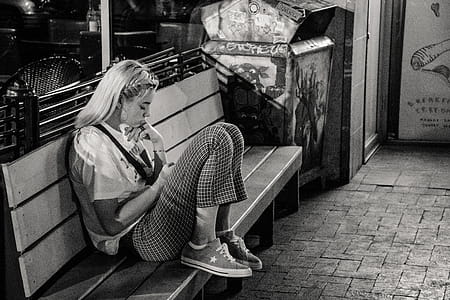 Woman Sitting On Bench thumbnail