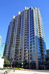 white high rise building at daytime thumbnail
