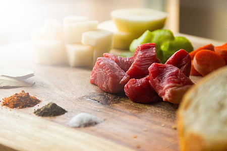 raw meat on top brown wooden surface thumbnail