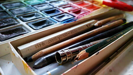 assorted-color pencils on case thumbnail