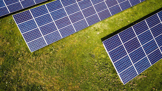 blue solar panel on green field thumbnail