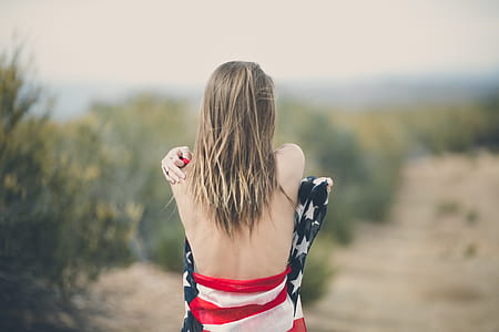 woman wearing red, white, and black bottoms thumbnail