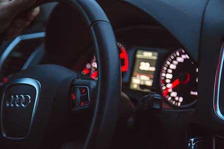 selective focus photography of black Audi steering wheel thumbnail