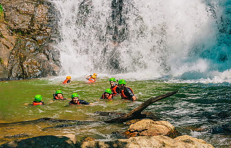 Group of People on Body of Water thumbnail