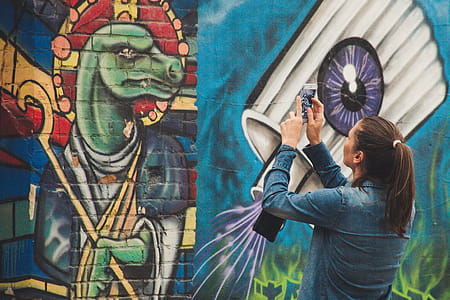 Photo of a Woman Taking Picture thumbnail