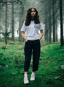 woman standing while pocket in hand thumbnail