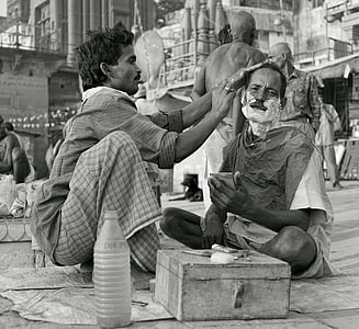 man giving haircut thumbnail