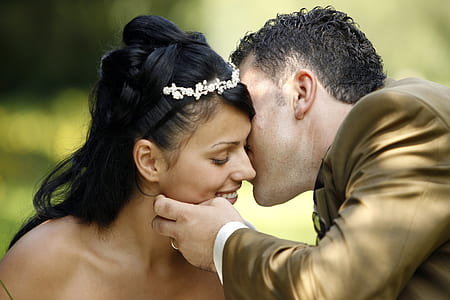 man kissing woman on cheek thumbnail