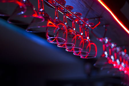 selective focus photo of champagne glasses hanging on rack thumbnail