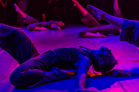 man performing at stage thumbnail
