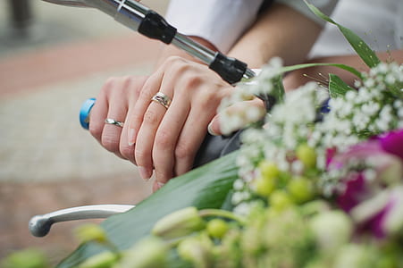 coupe holding motorcycle grip in closeup photo thumbnail