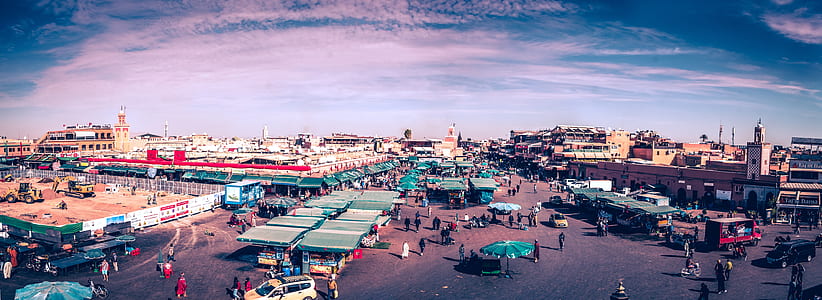 birds eye photography of people gathering beside stall thumbnail