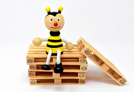 bee figurine on palette with white background thumbnail