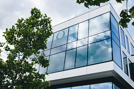 Office building windows and blue sky thumbnail