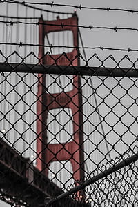 view through chain link fence of Golden Gate Bridge, San Francisco during daytime thumbnail