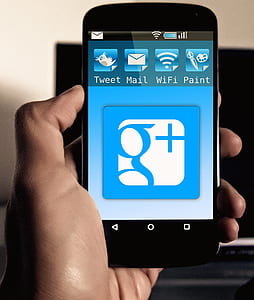 person holding black smartphone thumbnail