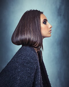 side view photo of woman wearing blue towel thumbnail