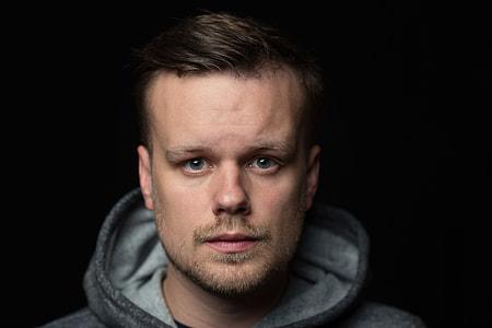 man in black hoodie thumbnail