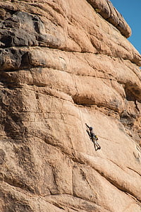 person climbing on hill thumbnail