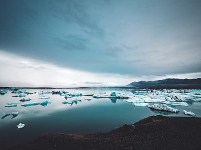 landscape photograph of body of water during daytime thumbnail