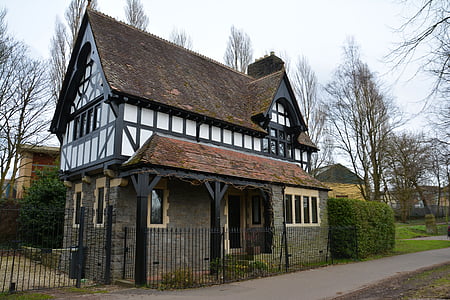 brown and gray 2-storey house during daytime thumbnail