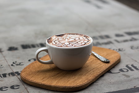 ceramic coffee mug with coffee latte on board thumbnail