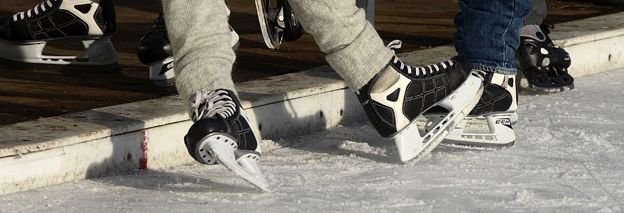 photography of people playing ice skates thumbnail