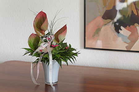 green leaf plants and clear glass vase thumbnail