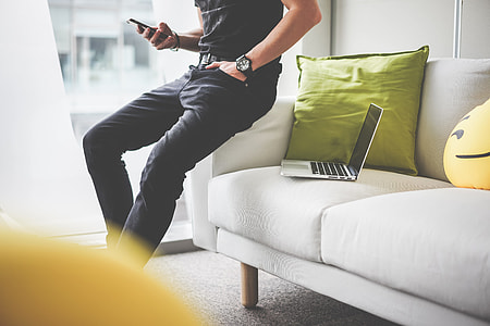 Man Using His Smartphone in the Office thumbnail