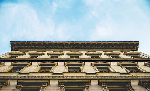 architectural photography of brown building during daytime thumbnail