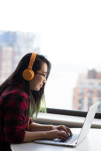 Photography of Woman Using Laptop thumbnail