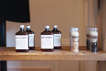 four brown glass bottles with brushes packs thumbnail