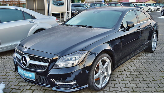 black Mercedes-Benz sedan thumbnail