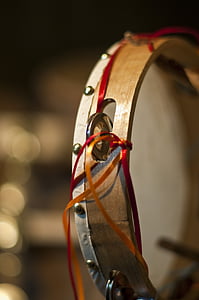 selective focus photo of brown wooden tamborine thumbnail