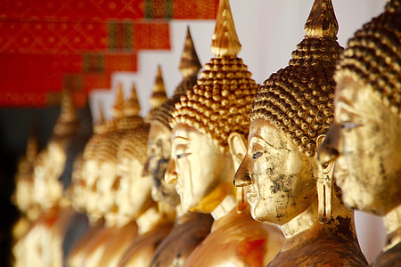 assorted gold statues thumbnail