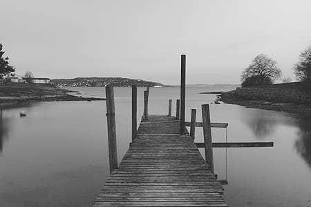 grayscale photo of body of water thumbnail