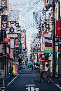 man and woman walking on street thumbnail